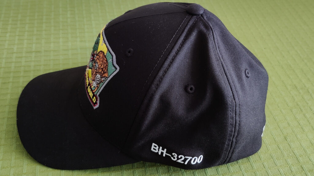 Side view of hat. "BH-32700" is embroidered on the side.