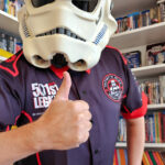 I am wearing the shirt and my stormtrooper helmet. I'm facing the camera, giving a thumbs-up.