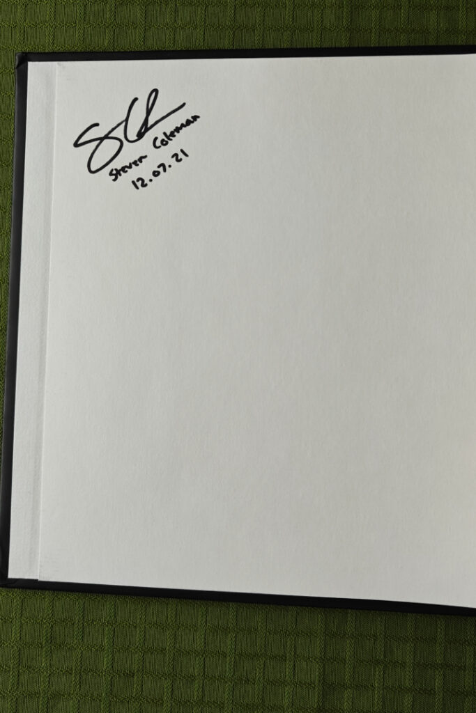 Coleman's signature inside the book. The autograph is dated 12.07.21.
