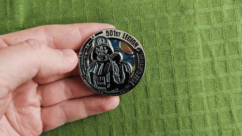 An animated GIF of me flipping the coin from one side to the other.