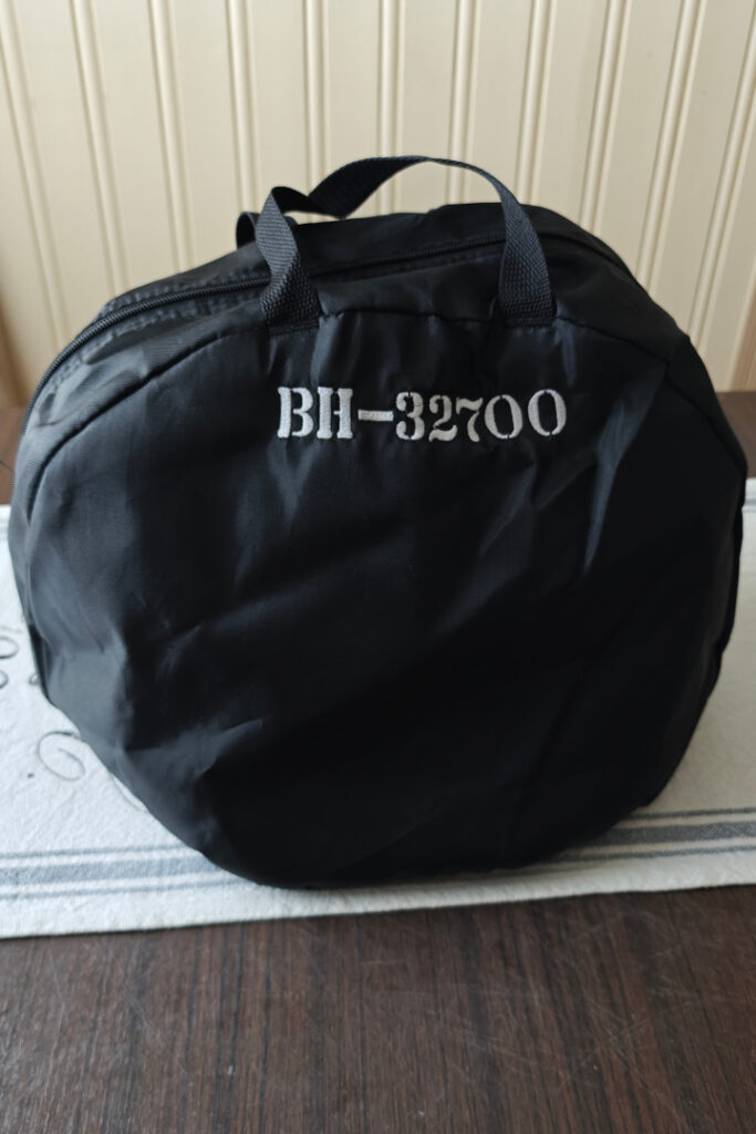 A black bag with text: "BH-32700"
