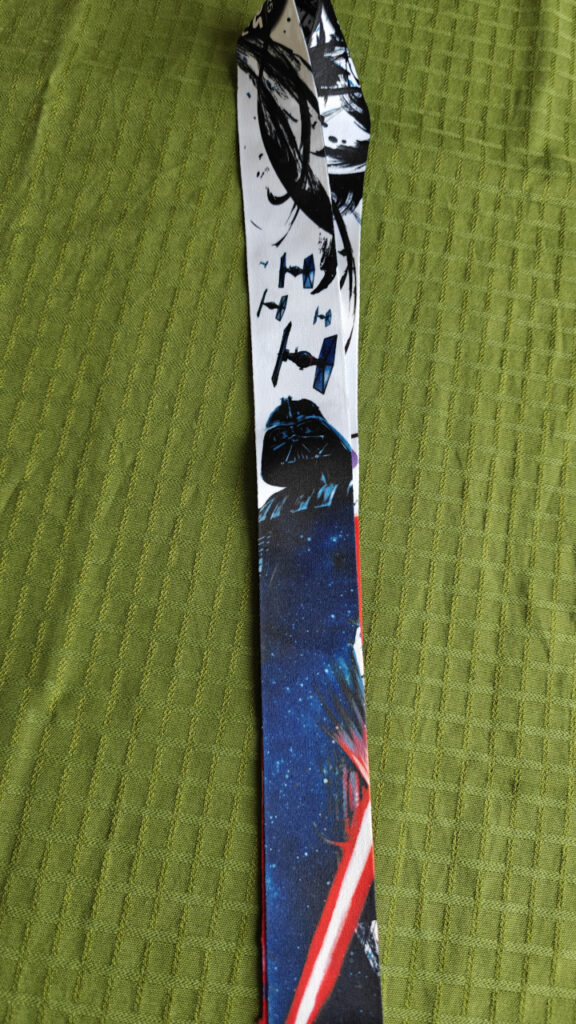 The outside art is Darth Vader and TIE Fighters.