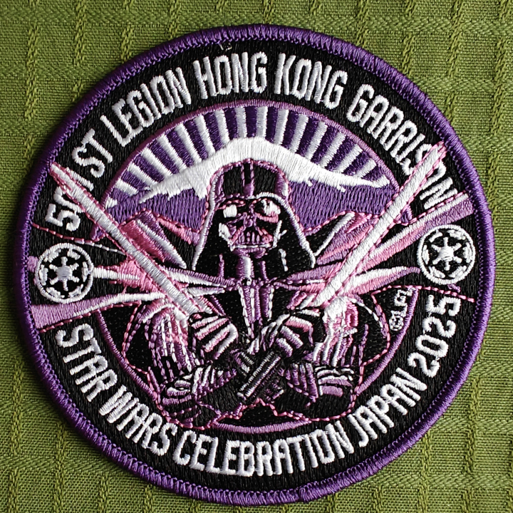 An embroidered patch featuring Darth Vader with two lightsaber in front of Mt. Fuji. Text: "501st Legion Hong Kong Garrison. Star Wars Celebration Japan 2025".