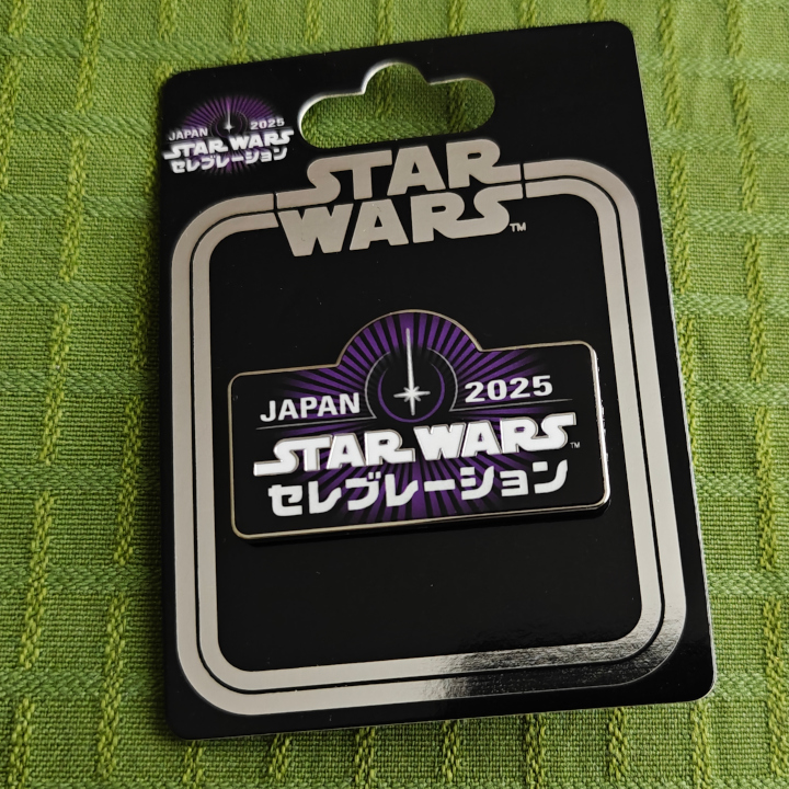 The celebration logo as a pin.
