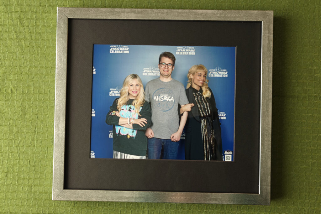 A framed photo with Ahsley Eckstein, Rosario Dawson and me. 